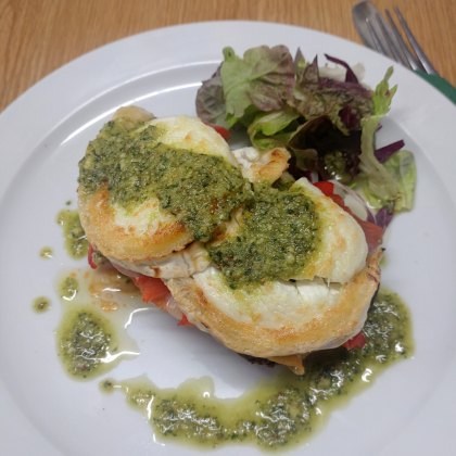 Roasted Red Pepper, Parma Ham, Goats Cheese and Tomato Bruschetta with a Pesto Dressing